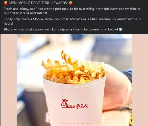 Employee holding fries for Mobile Drive Thru Campaign