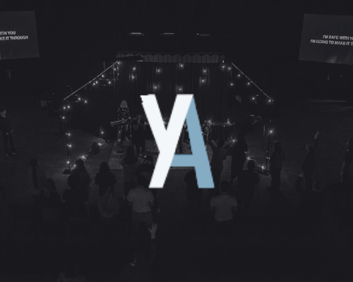 An image of a sanctuary full of worshippers in the background with the GRACEHOUSE Young Adult group logo in the foreground.